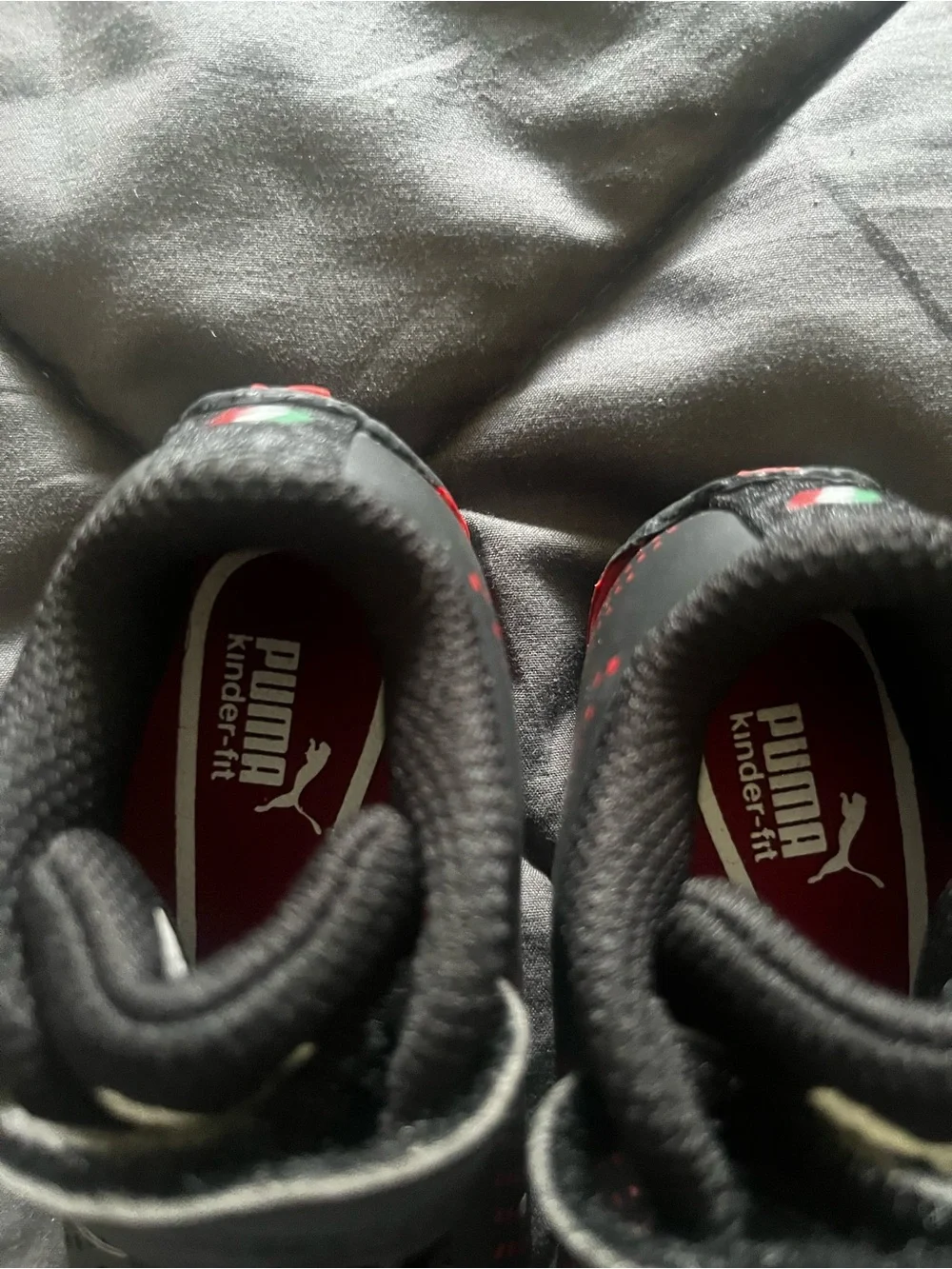 Puma Kids Black Sneakers with Red Underlay and White Puma Logos